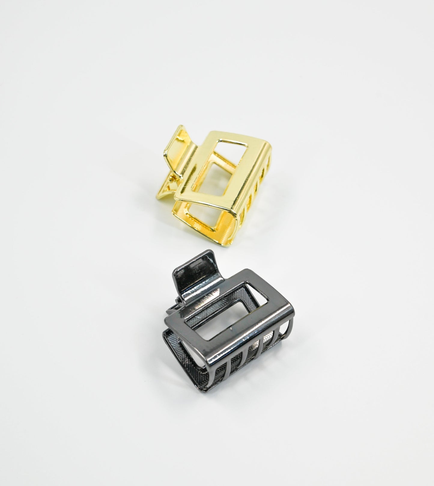 2 small claw clips - gold and dark grey