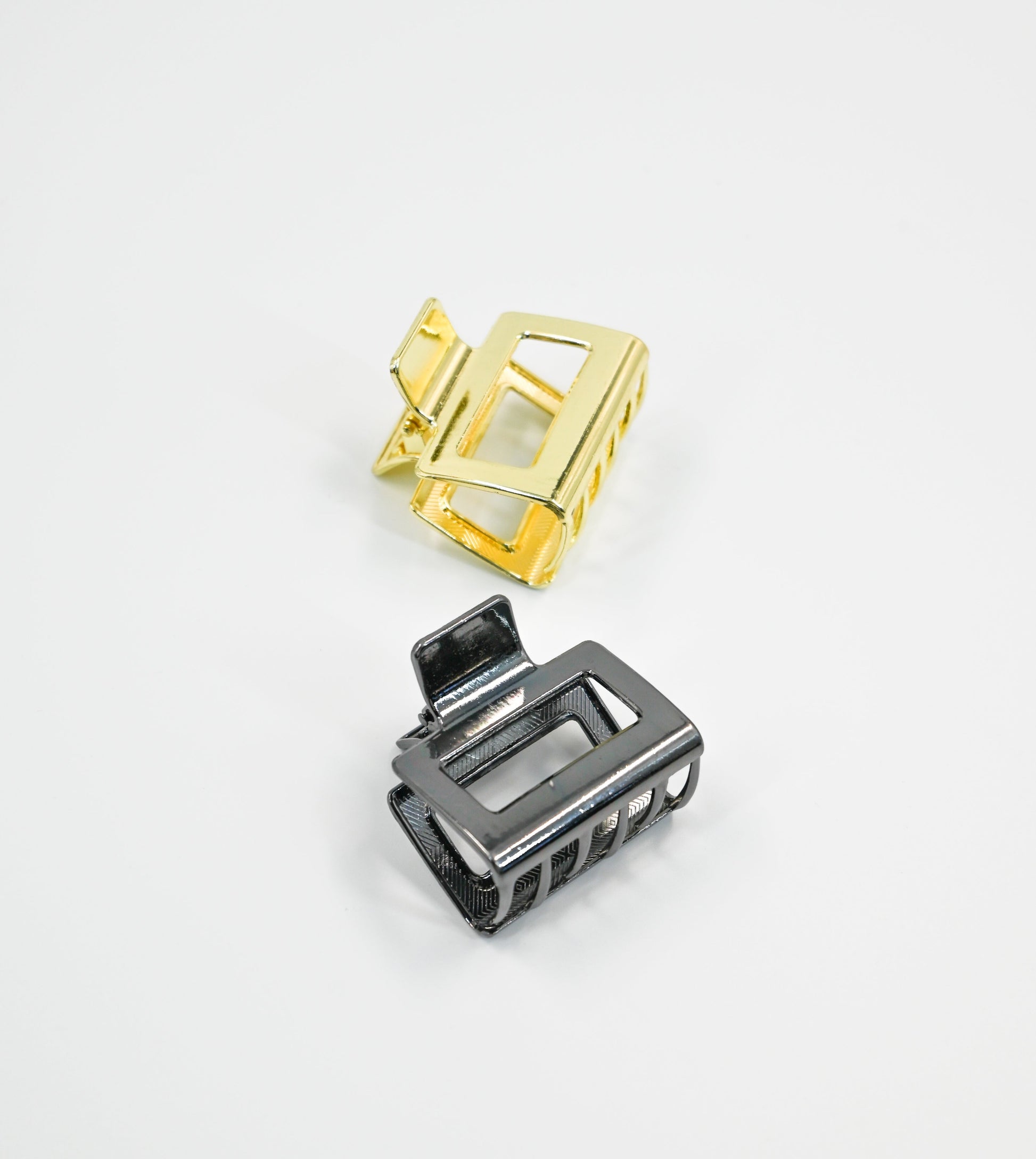 2 small claw clips - gold and dark grey