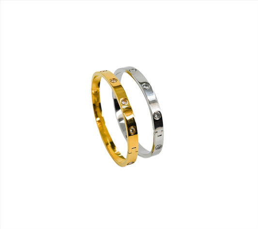Cartier style bracelet in gold and silver